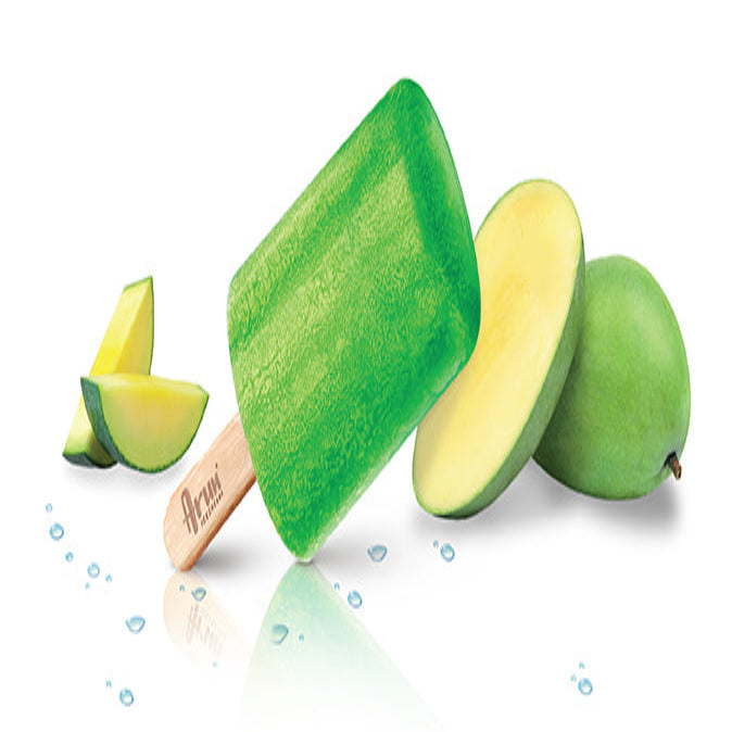 Green popsicle with mango slices on a white background