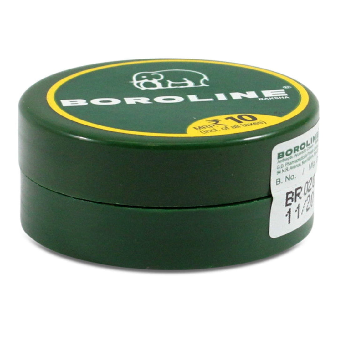 Green container of Boroline lotion with visible branding on a white background
