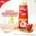Kellogg's Oats package on a wooden surface with a bowl of oats and text about nutritionists' trust.