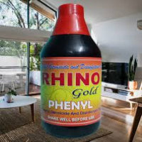 Bottle of Rhino Gold Phenyl in a living room setting